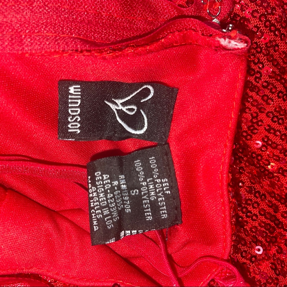 Red sequin long dress with slit.